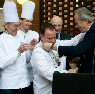 Chef Dale Miller is awarded Global Master Chef status.